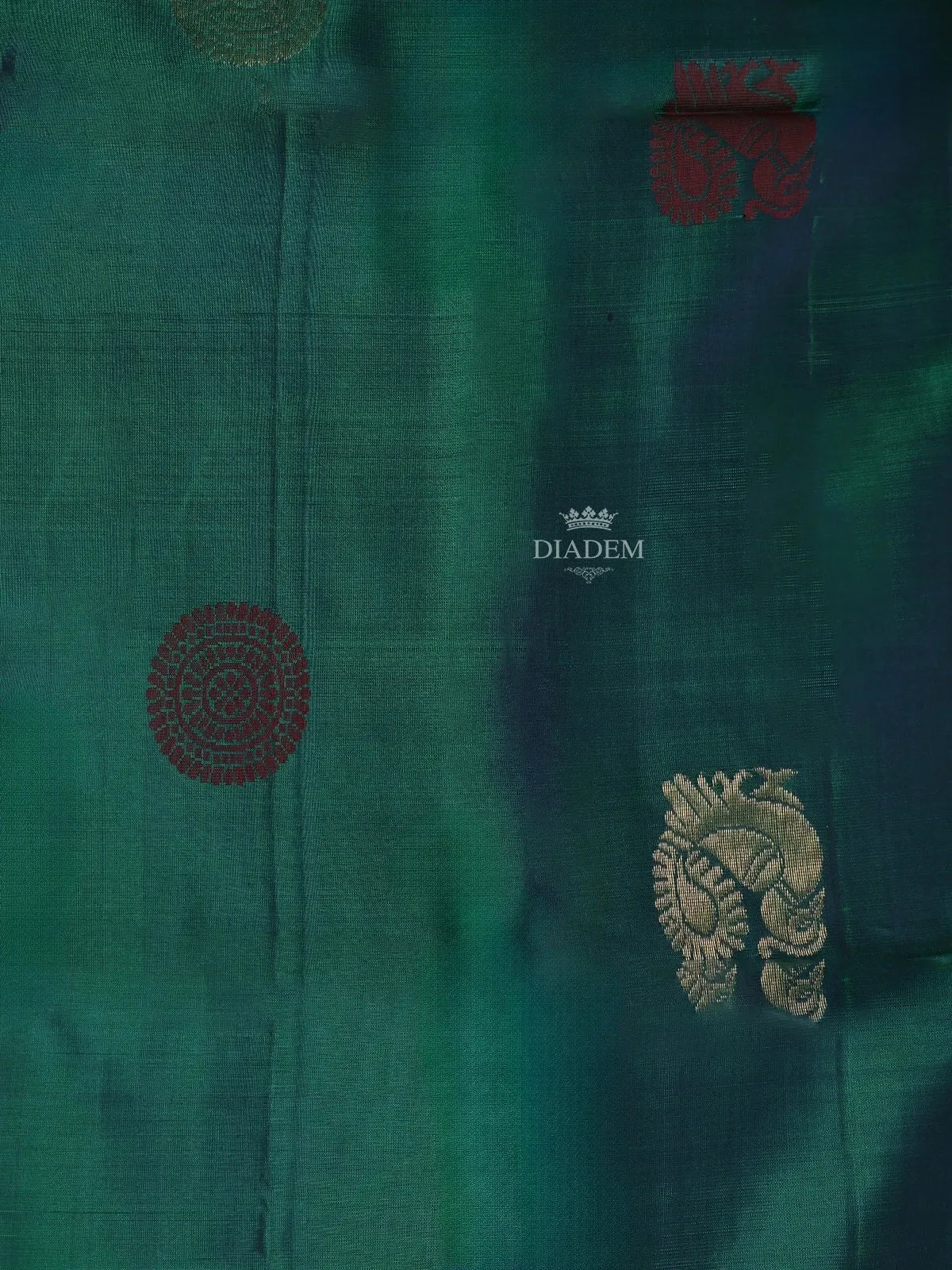 Dark Green Soft Silk Saree with Chakra and Peacock Motifs on the Body and without Border